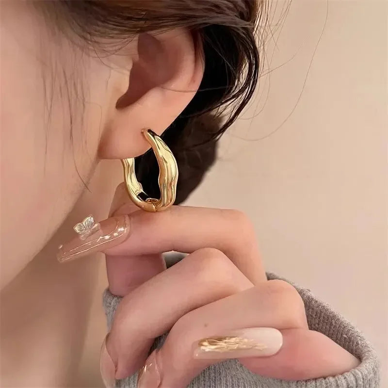 Boucles d'oreilles créoles de couleur or et argent