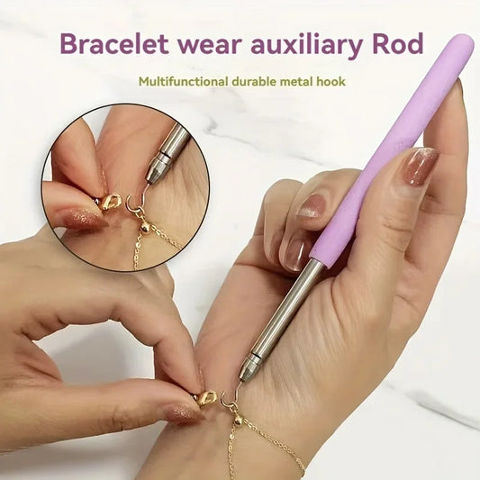 Outil d'aide à la fixation de bijoux