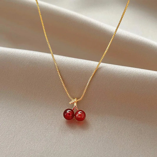 Colliers avec pendentif cerise rouge